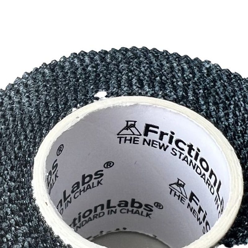 Makrobild av vävd textur och tryck på Friction Labs tejp