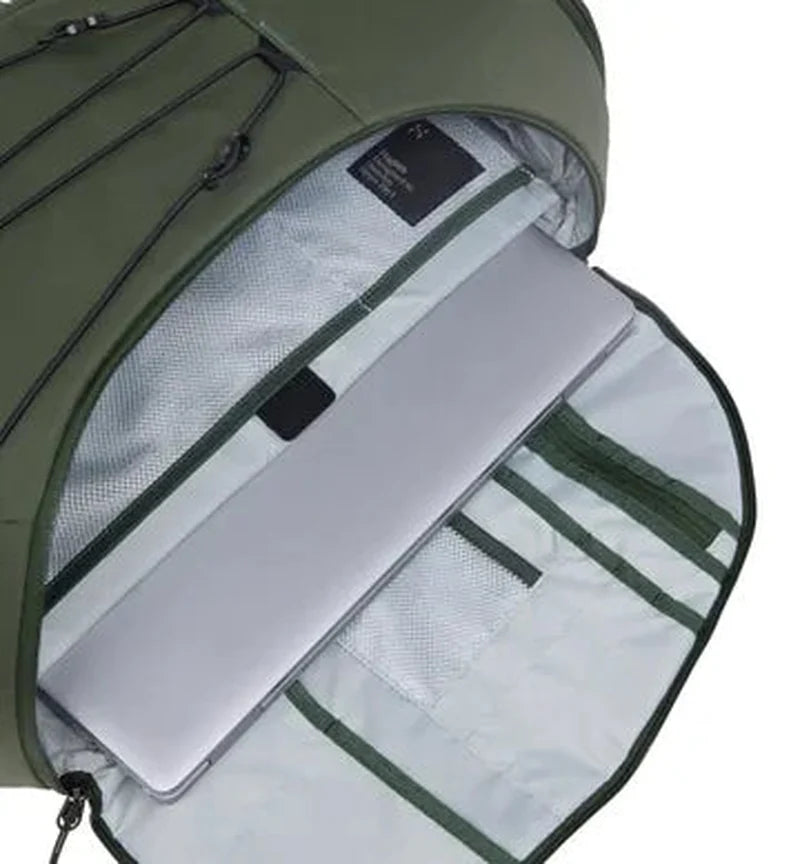 Öppen grön Haglöfs ryggsäck med laptopfack och nätväska