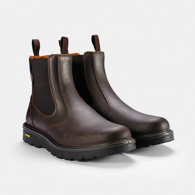 Par mörkbruna läderchelseabötar med gul Vibram-text